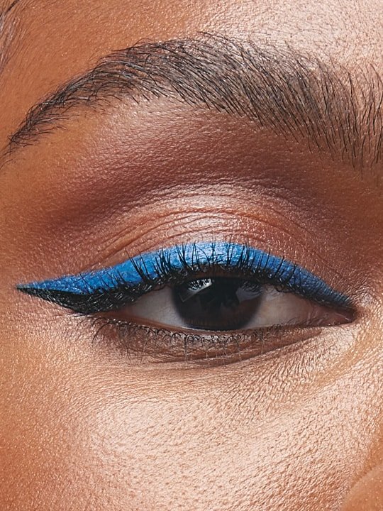 close-up of model wearing a blue eyeliner look