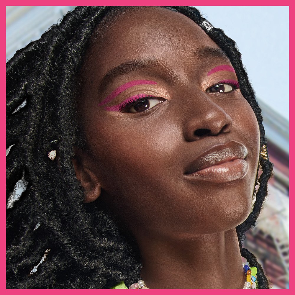 Close-up of brown eyes with bronze eyeshadow, showing one of the best eyeshadow looks for brown eyes.