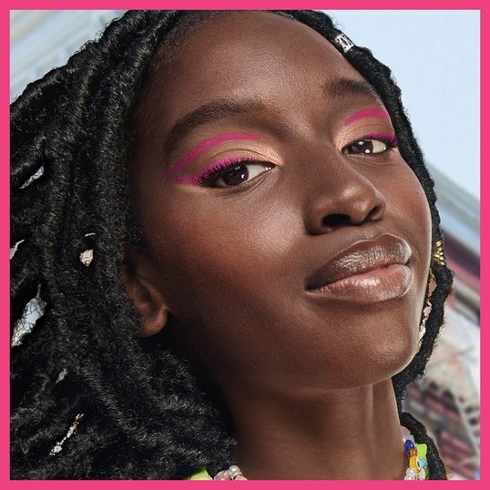 Close-up of brown eyes with bronze eyeshadow, showing one of the best eyeshadow looks for brown eyes.